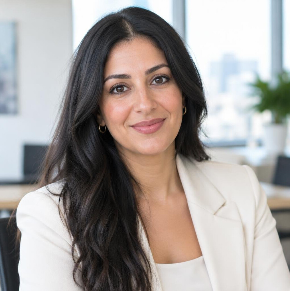 Portrait of a professional woman with dark hair in an office